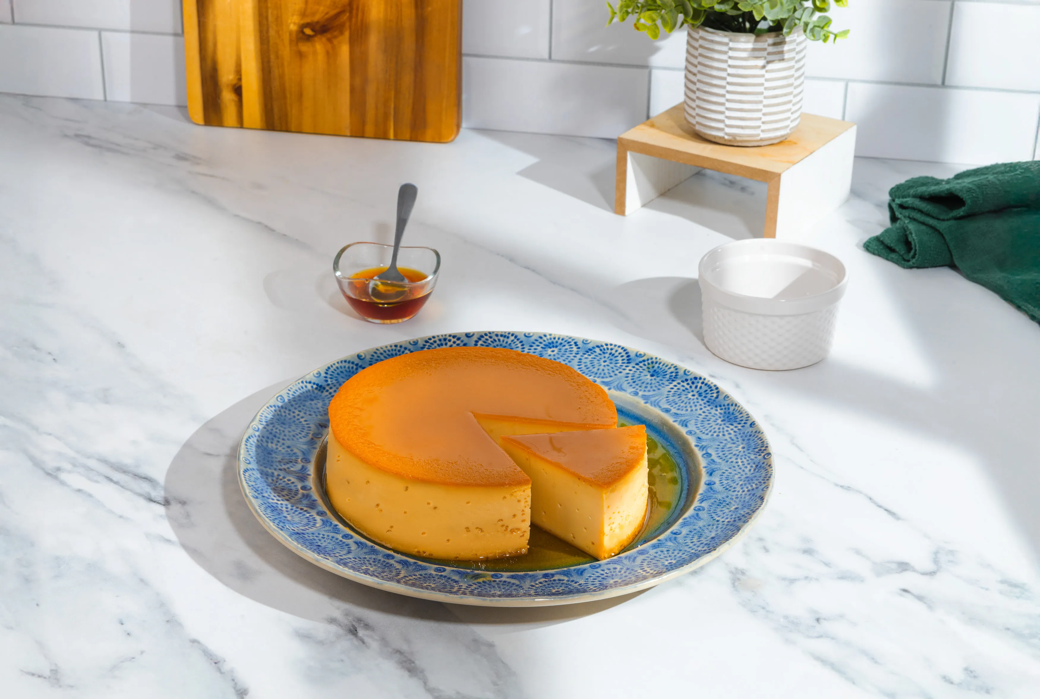 Piece of Flan being cut out of the cake