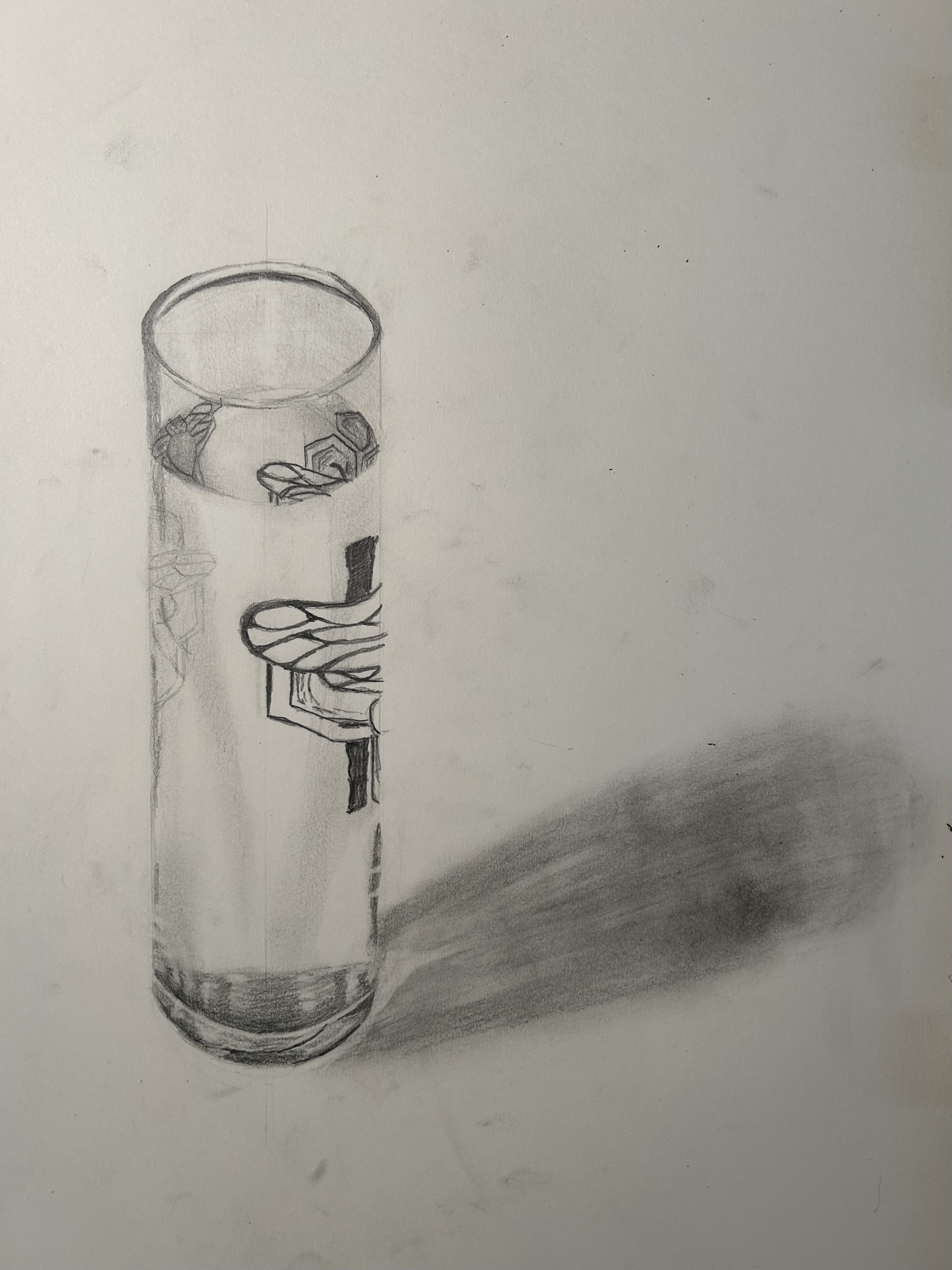 Graphite still life of a glass of water
