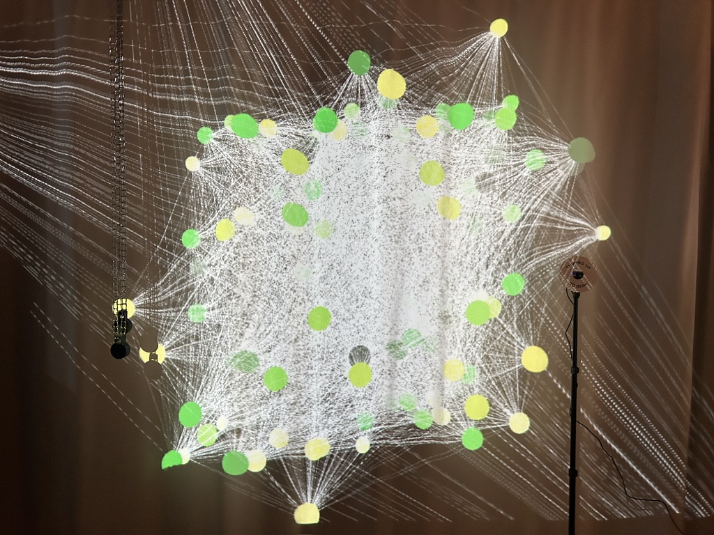 large network with nodes and lines projected to a screen