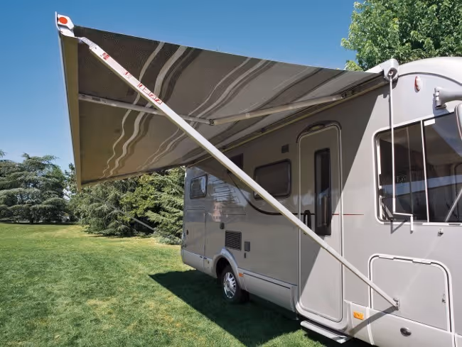 Campervan awning fully extended outdoors — campervan accessories and parts available at Campervinn