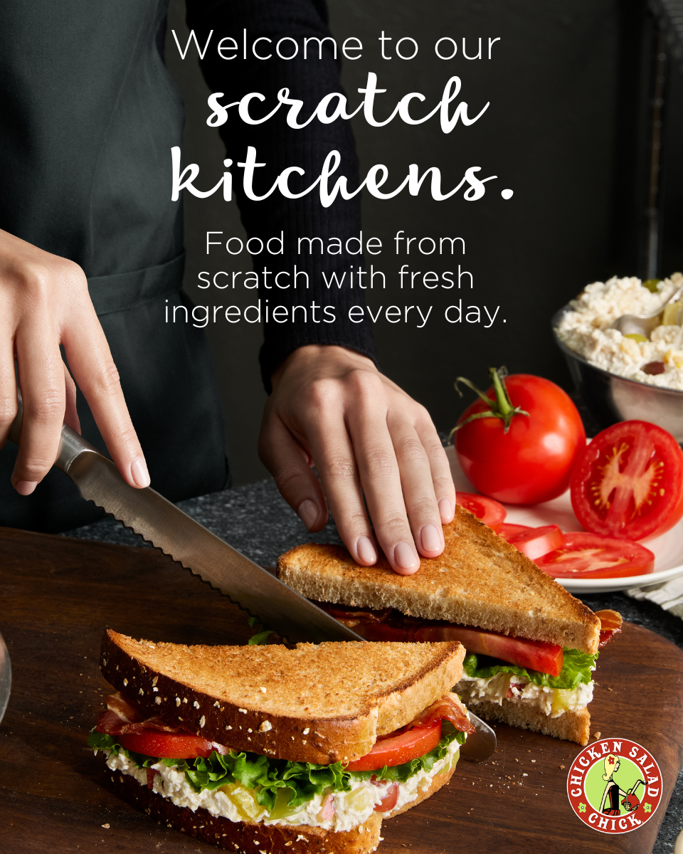 Chicken Salad Chick logo next to a croissant sandwich filled with chicken salad, lettuce, and tomato, with the tagline “Serving Chicken Salad And Nourishing The Soul.