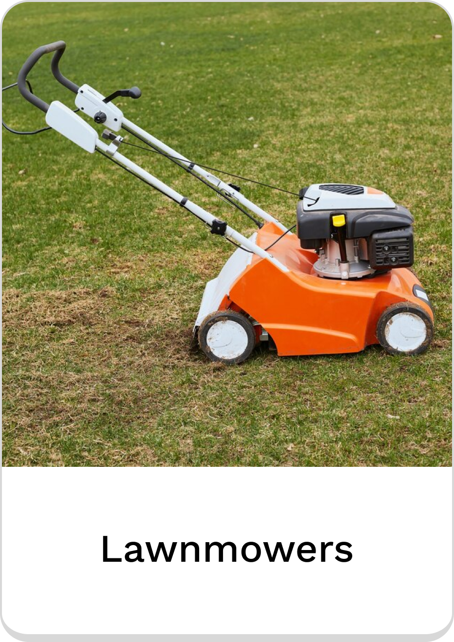 Orange lawnmower on grass, ideal for maintaining a lush lawn.