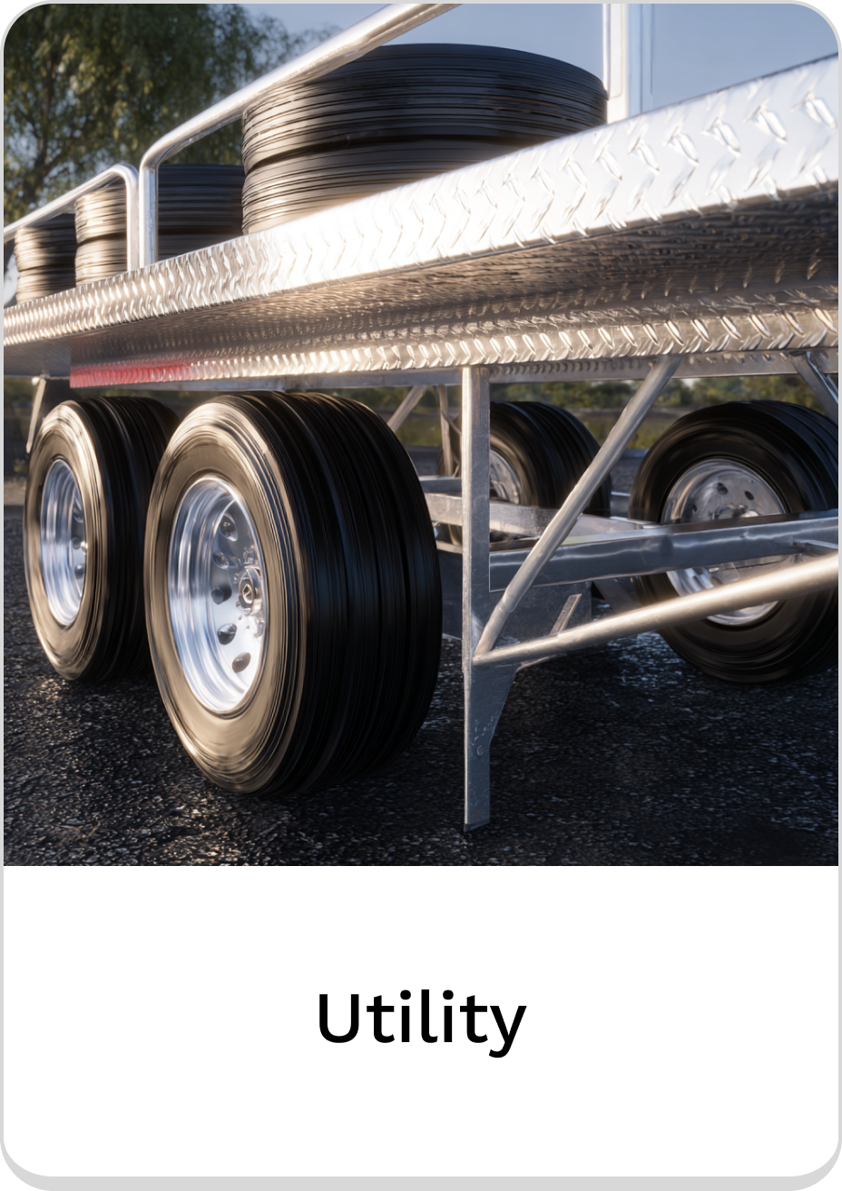 Utility trailer with durable wheels and sturdy aluminum frame for reliable transportation.