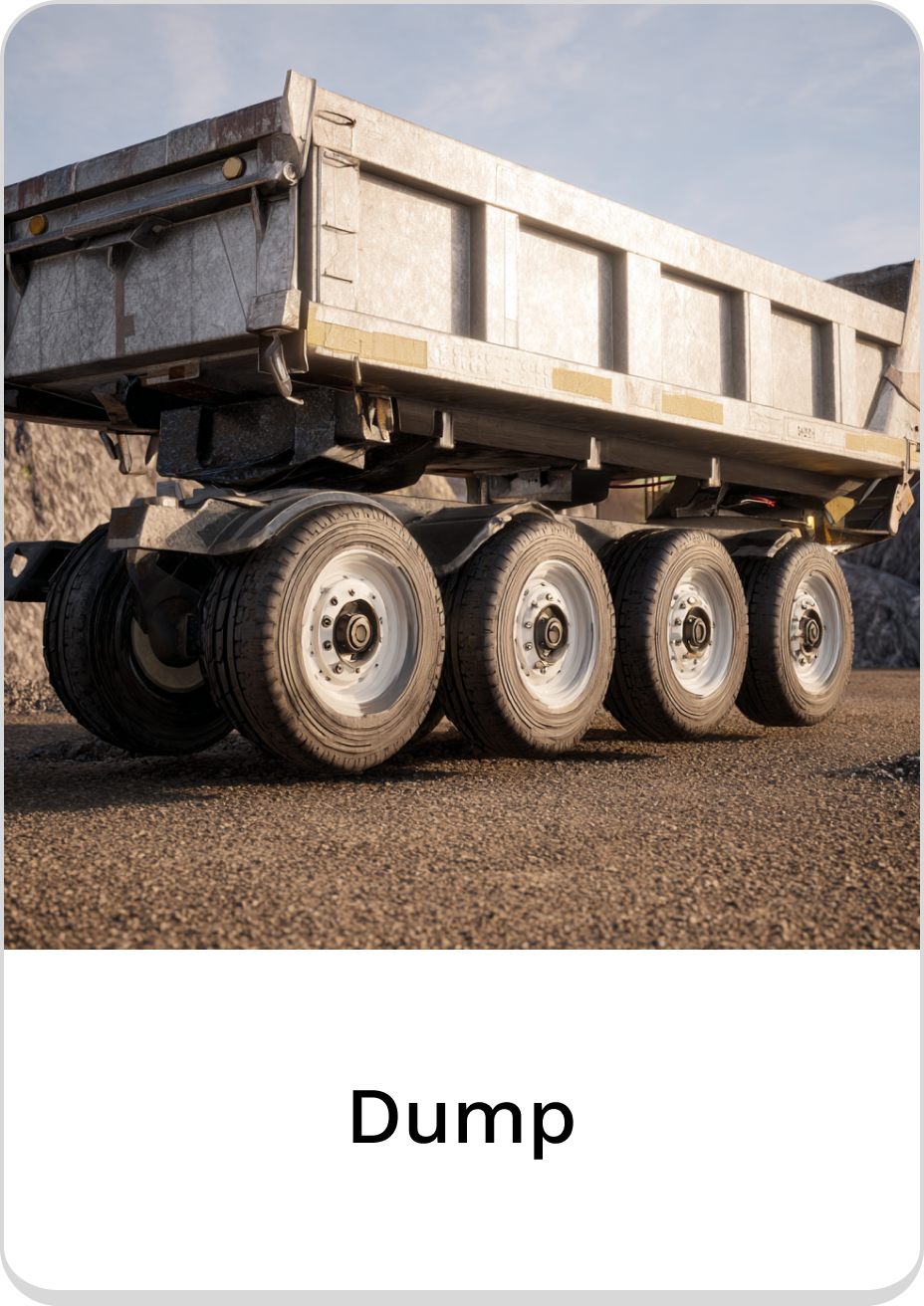 Heavy-duty dump trailer with robust wheels for construction and hauling tasks.