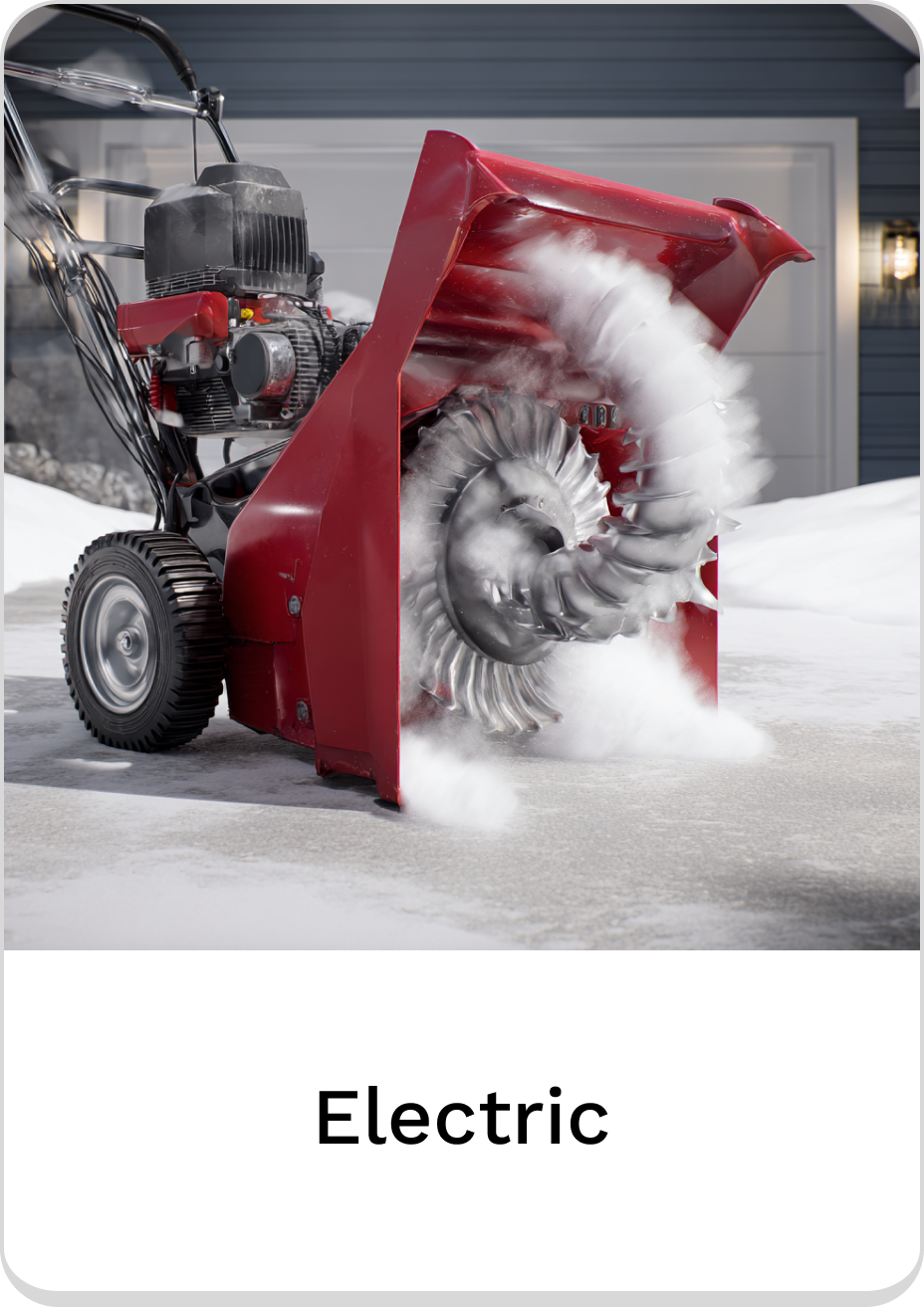 Red electric snowblower clearing snow from a driveway in winter.