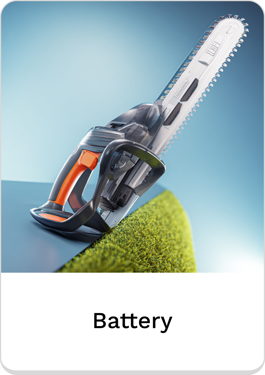 High-performance battery chainsaw displayed on artificial grass.
