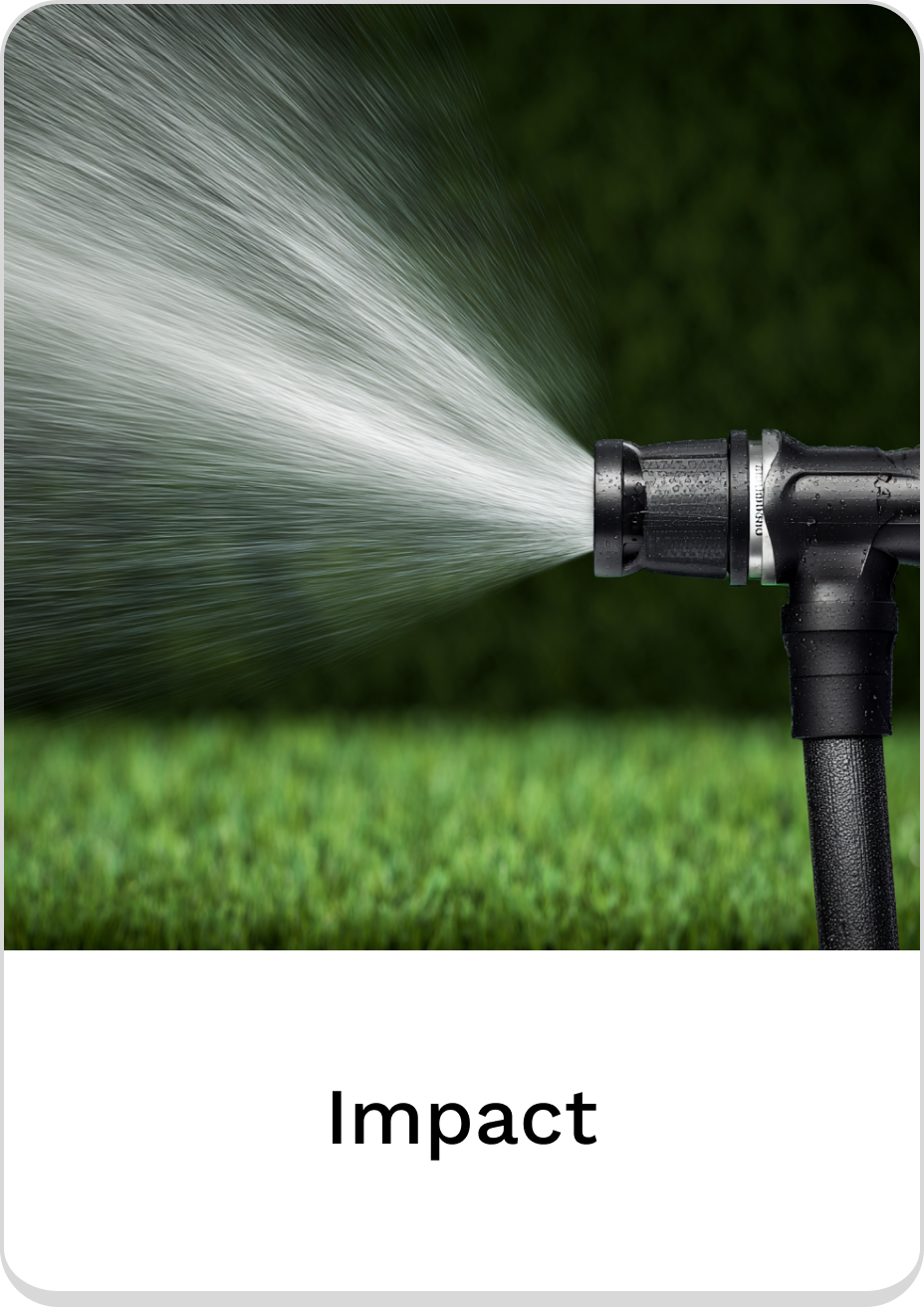 Impact sprinkler nozzle delivering powerful water spray for efficient garden watering.