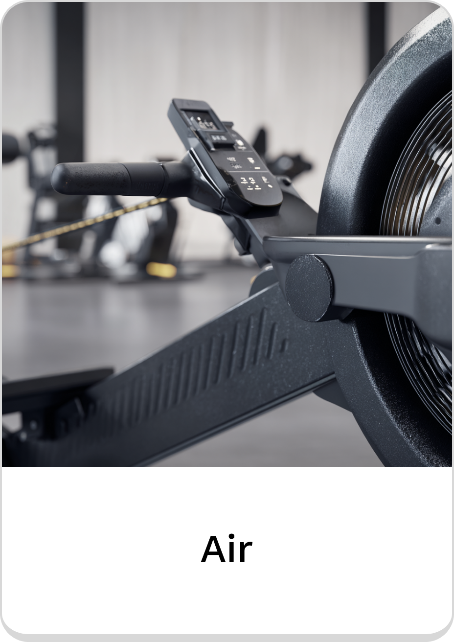 Close-up of air rower with digital display and ergonomic handle.