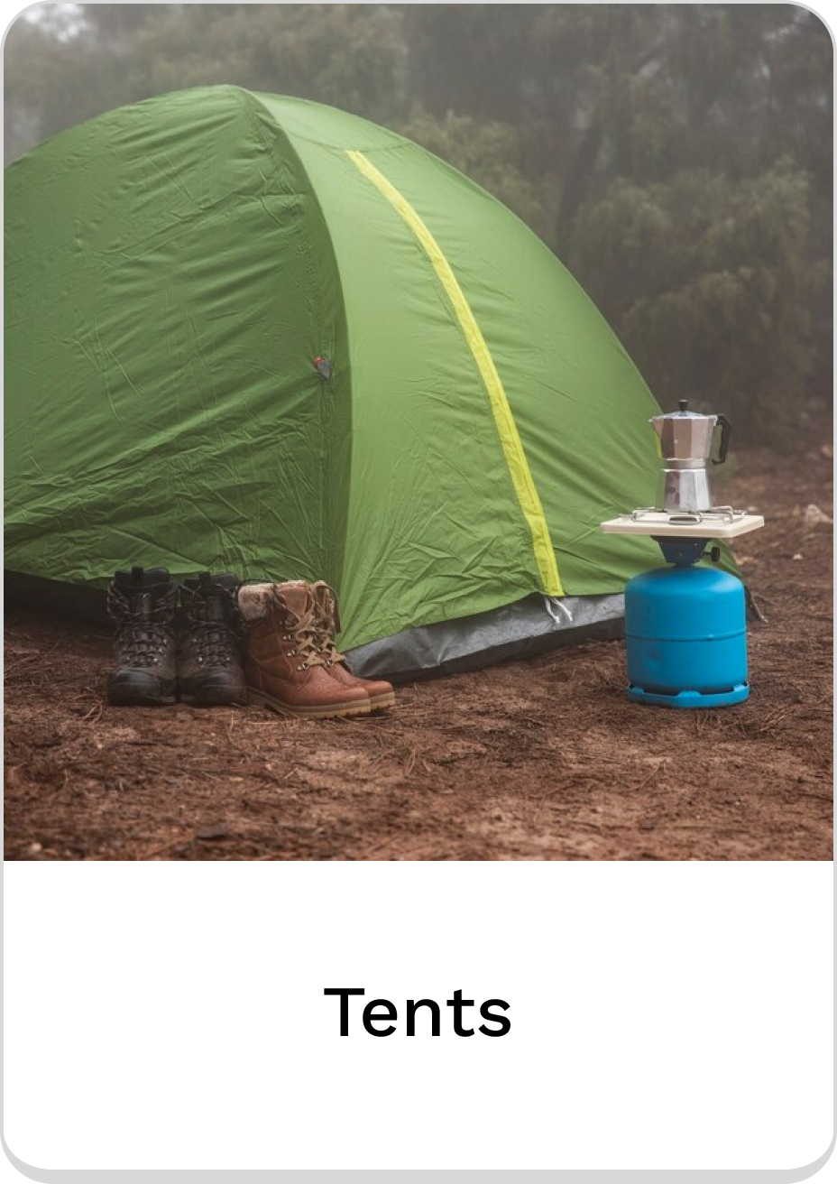 Green camping tent with gear, perfect for outdoor adventure in tents.