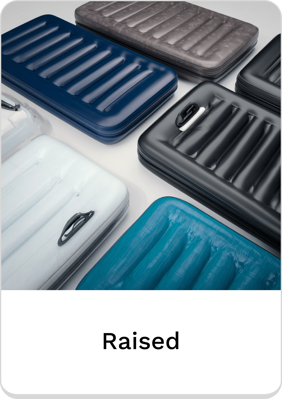 Assorted raised air mattresses in various colors and textures for comfortable sleeping.