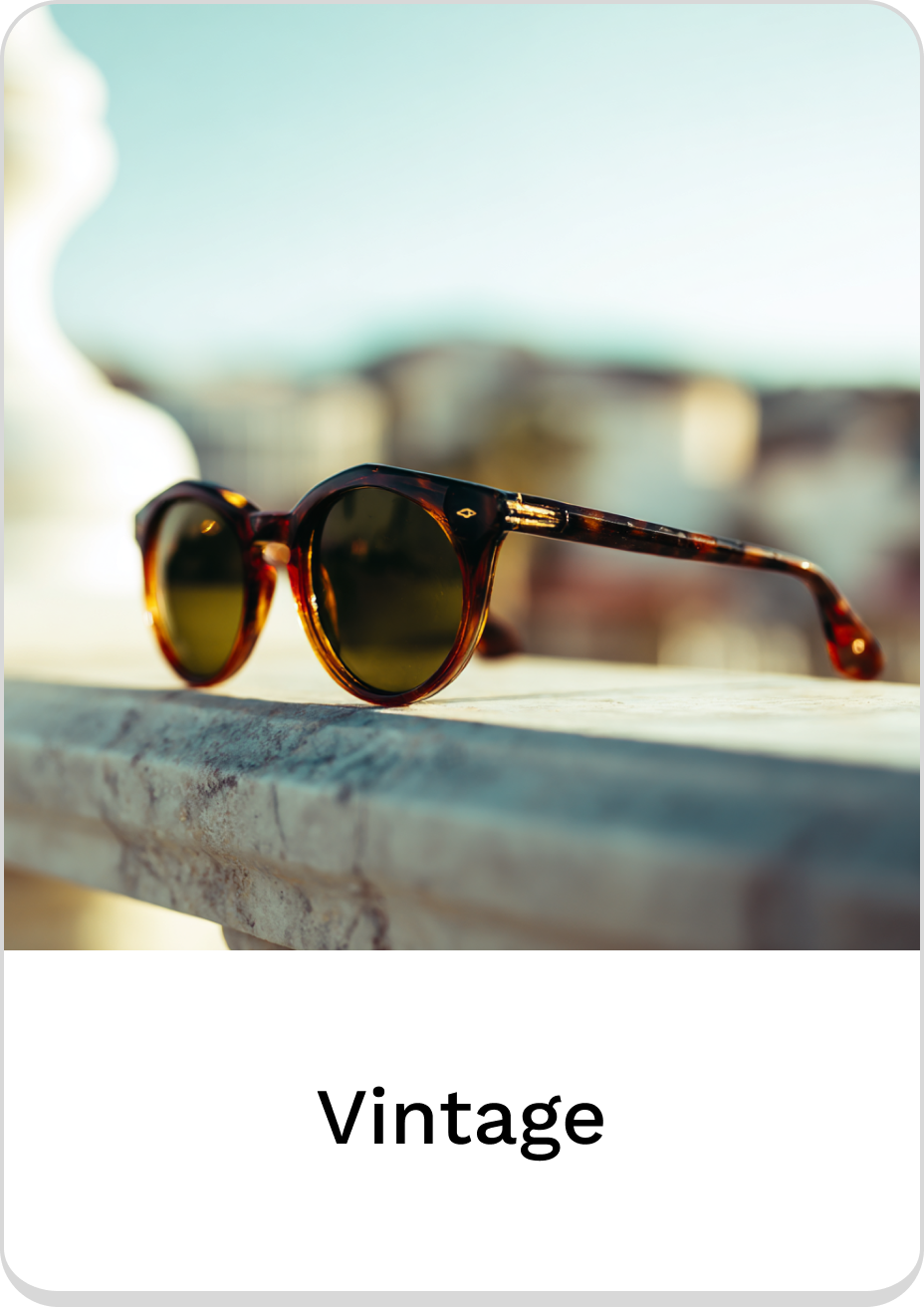 Stylish vintage sunglasses with tortoiseshell frames and dark lenses.