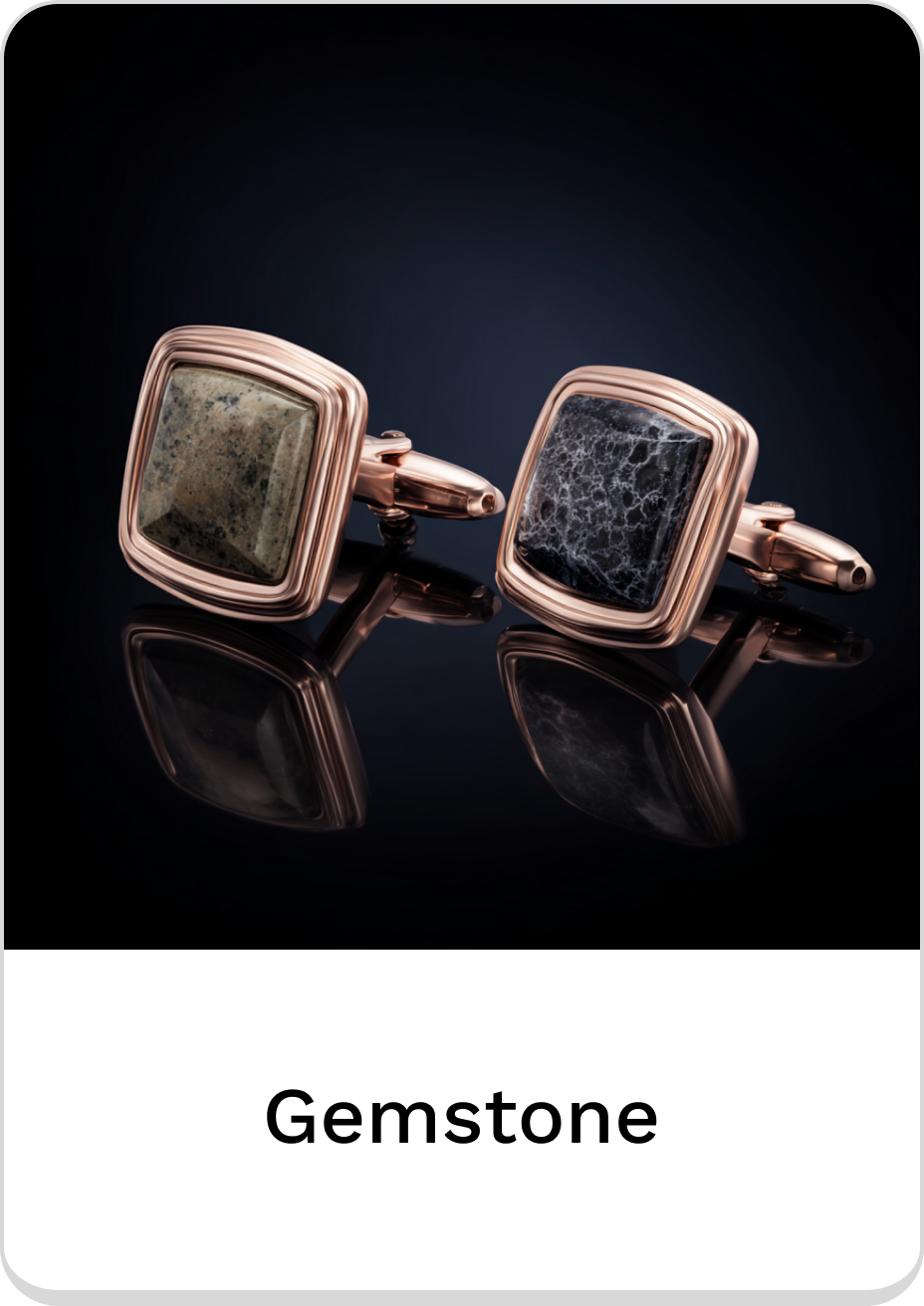 Elegant gemstone cufflinks featuring unique black and grey stones in rose gold.