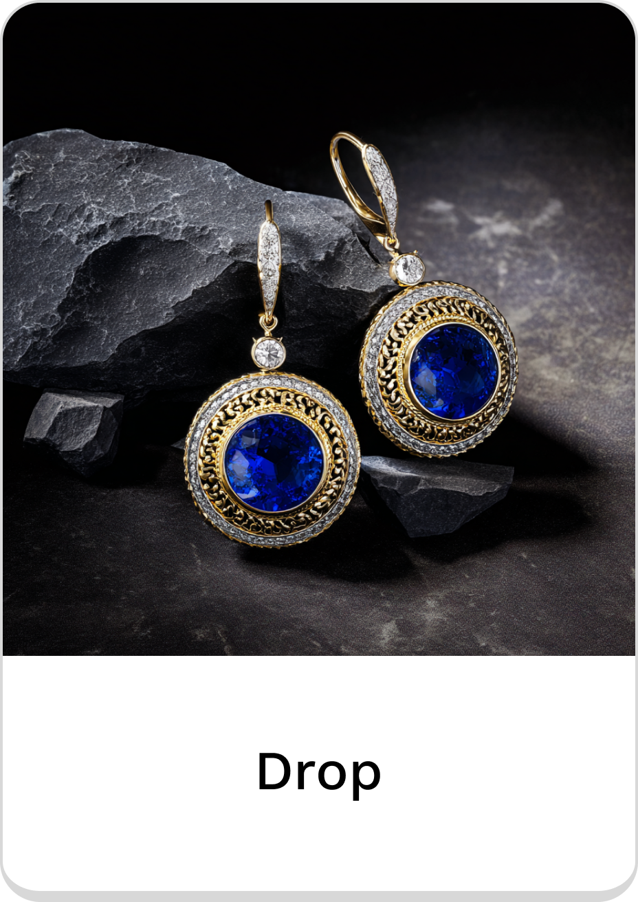 Elegant drop earrings featuring deep blue stones and intricate gold detailing.
