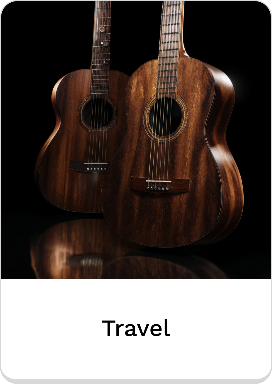 Two beautiful travel guitars showcasing rich wood grain and elegant design.