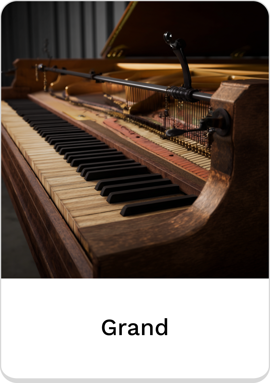Elegant grand piano showcasing detailed keys and craftsmanship.