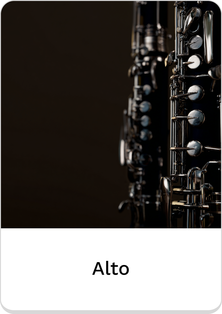 Close-up of alto saxophones showcasing their intricate keywork and design.