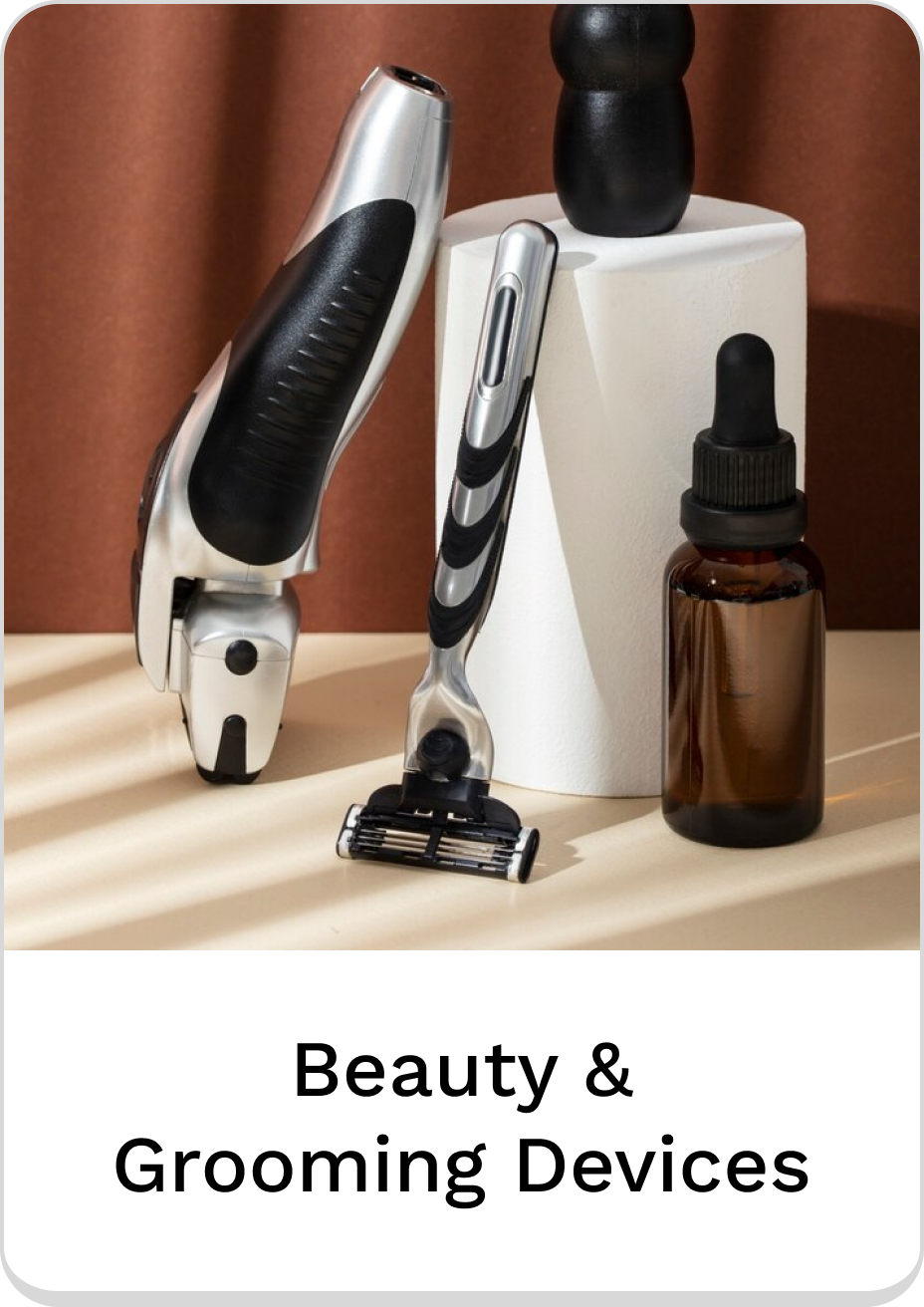 Stylish beauty and grooming devices on a flat surface for personal care.
