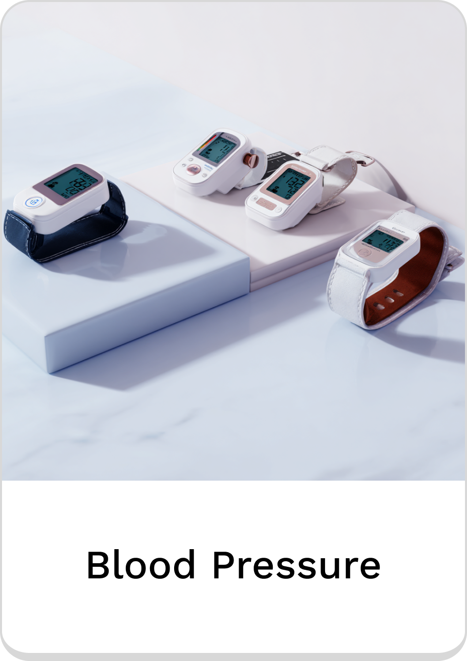 Collection of blood pressure monitors on a sleek white surface.