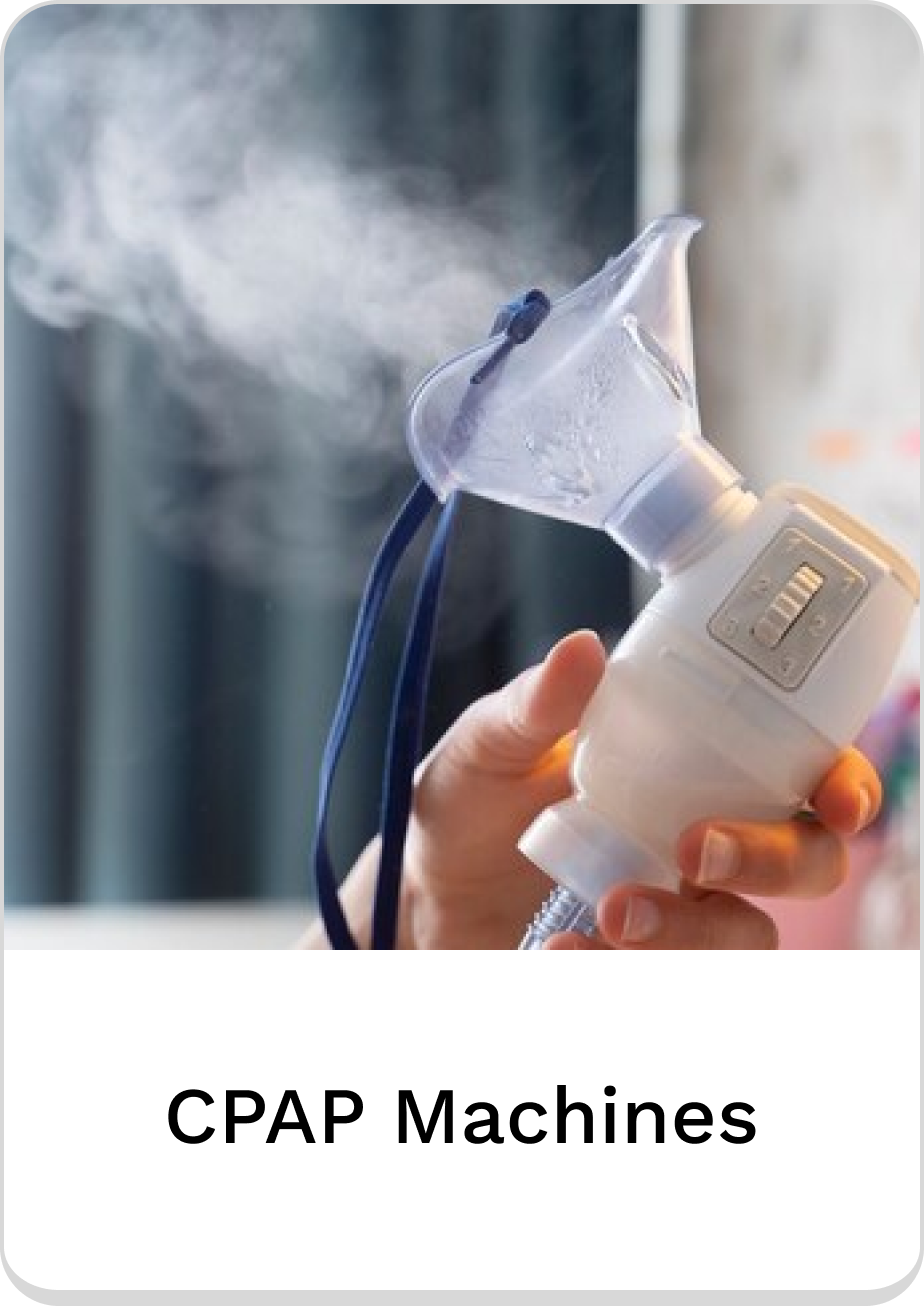 Hand holding a CPAP machine with steam, ideal for sleep apnea treatment.