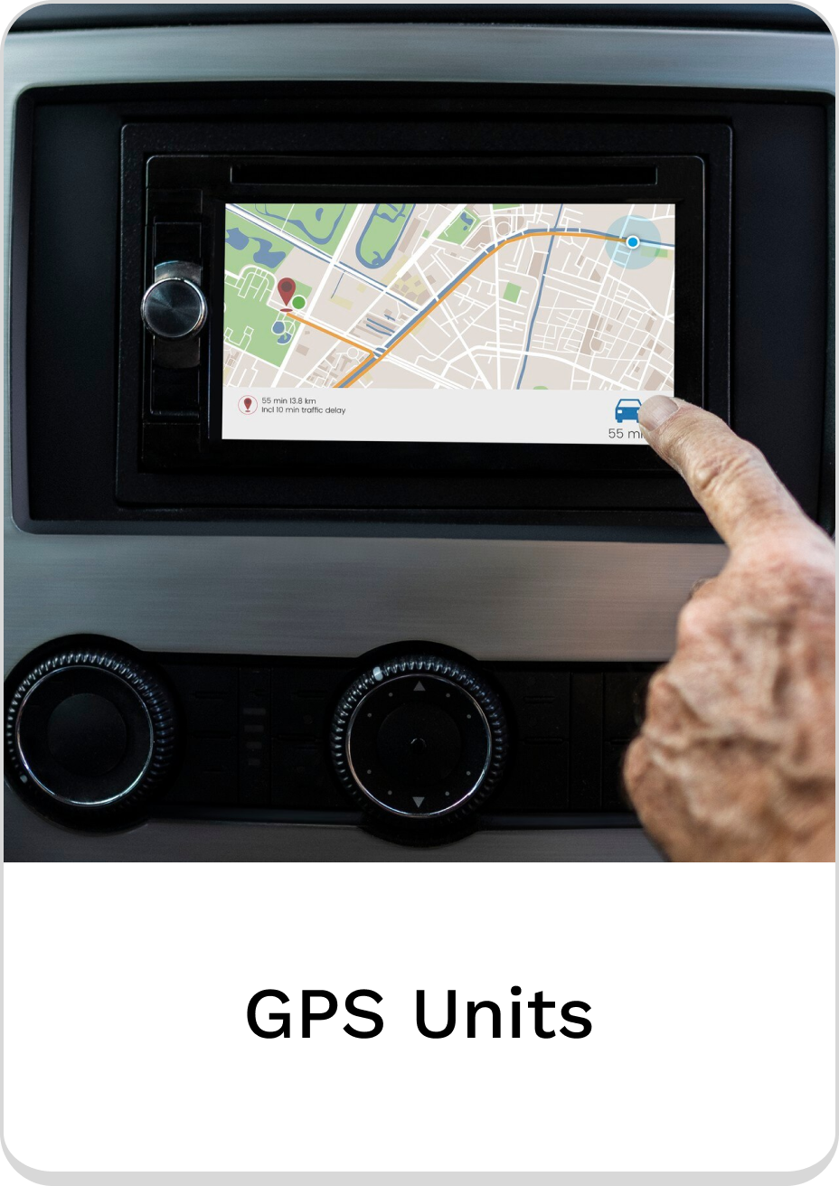 User interacting with a GPS unit displaying navigation map and route details.