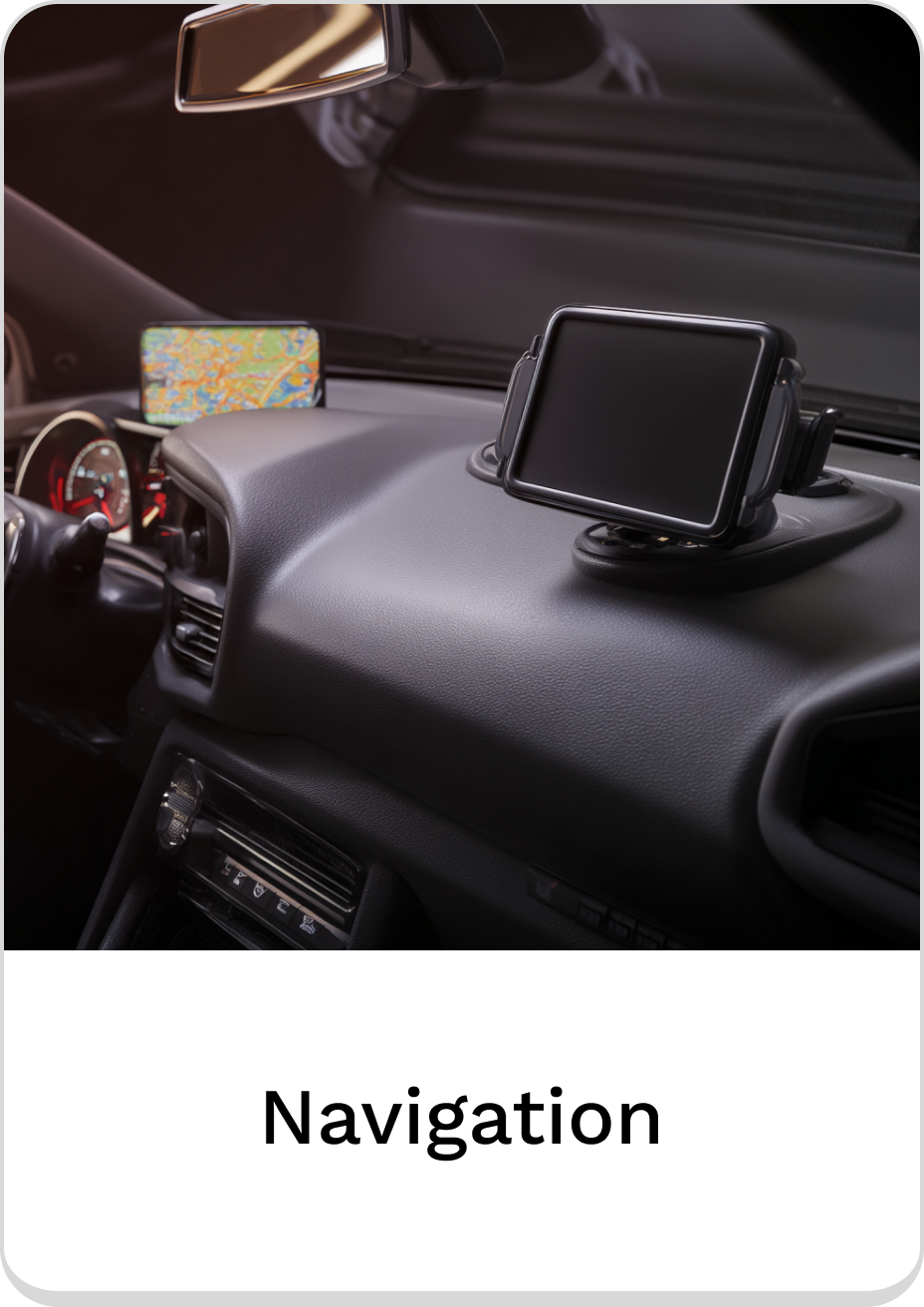 Car dashboard displaying navigation devices for safe driving and directions.