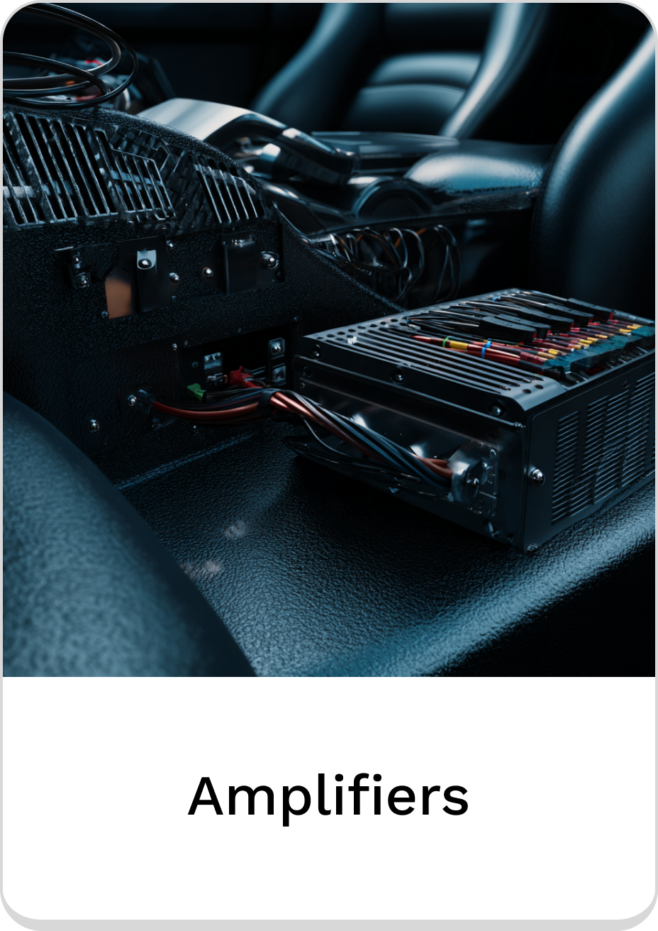 Close-up of high-performance car audio amplifiers installed in a vehicle.