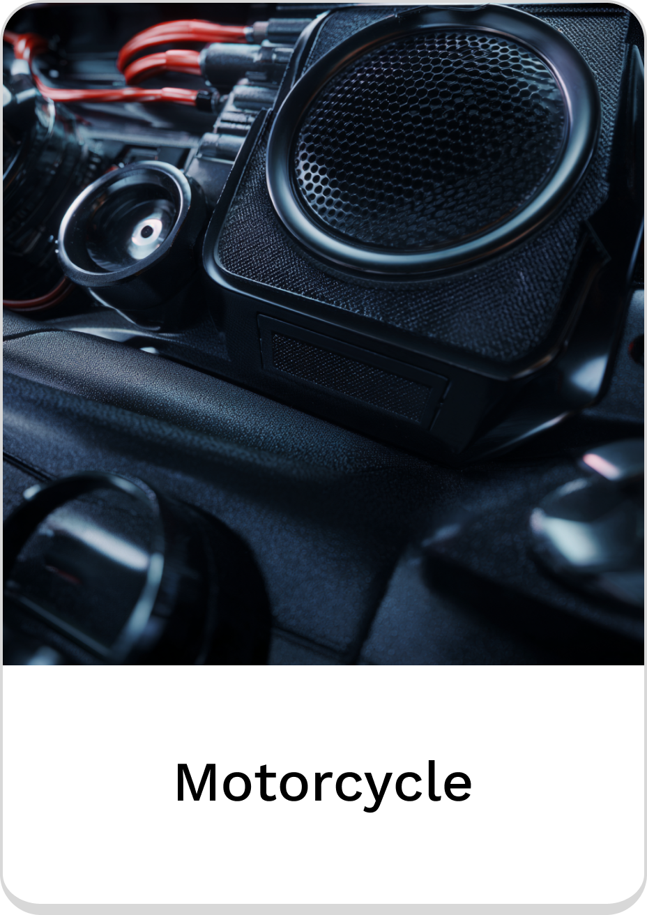 Close-up of motorcycle audio system components for optimal sound performance.