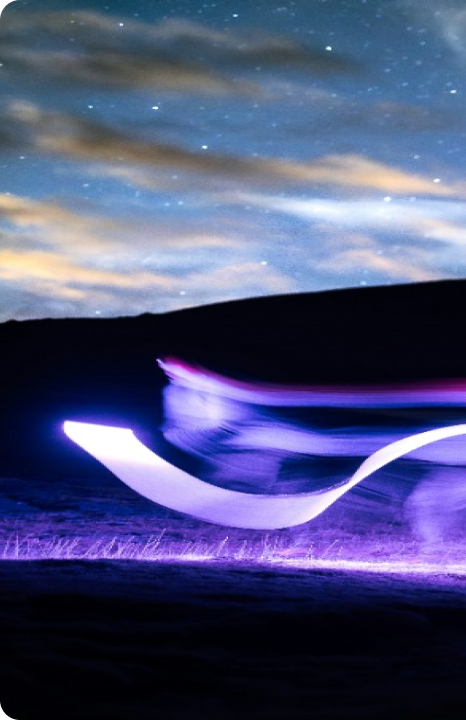 a-long-exposure-photo-of-a-wave-in-the-night-sky