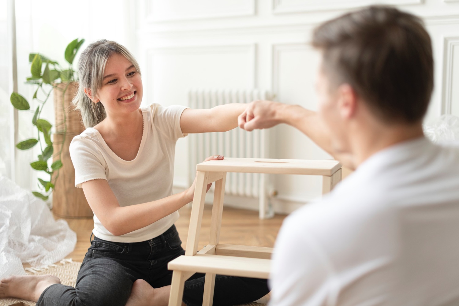 Physiotherapist visiting and treating a patient at home