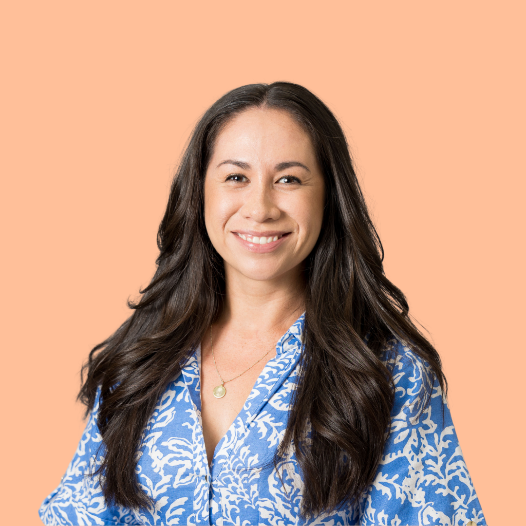 Headshot of Emma Earley co-founder of Hello Canopy on a peach background
