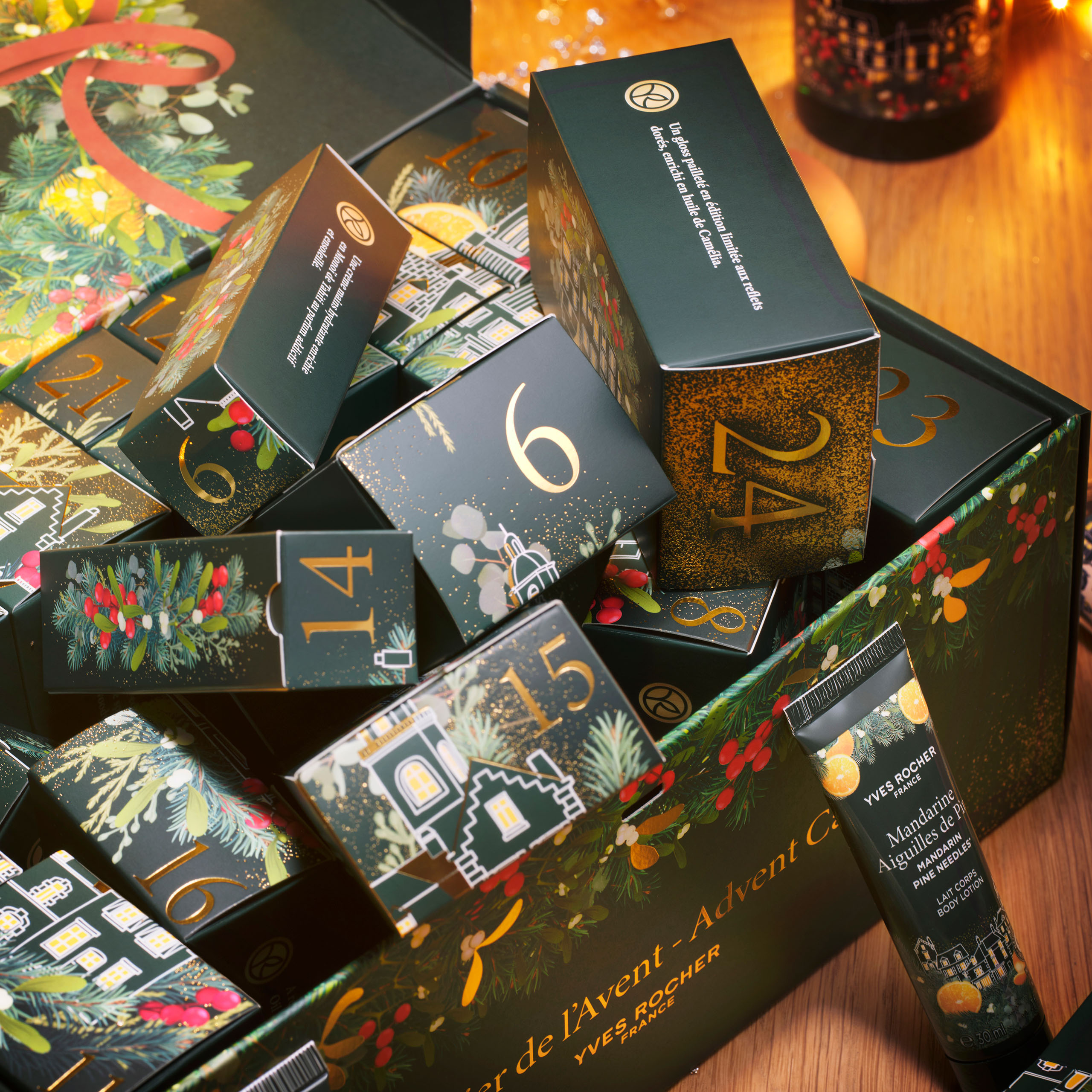 Open Yves Rocher Advent Calendar revealing numbered compartments and gift boxes, showcasing the illustrated village artwork and festive colour palette.