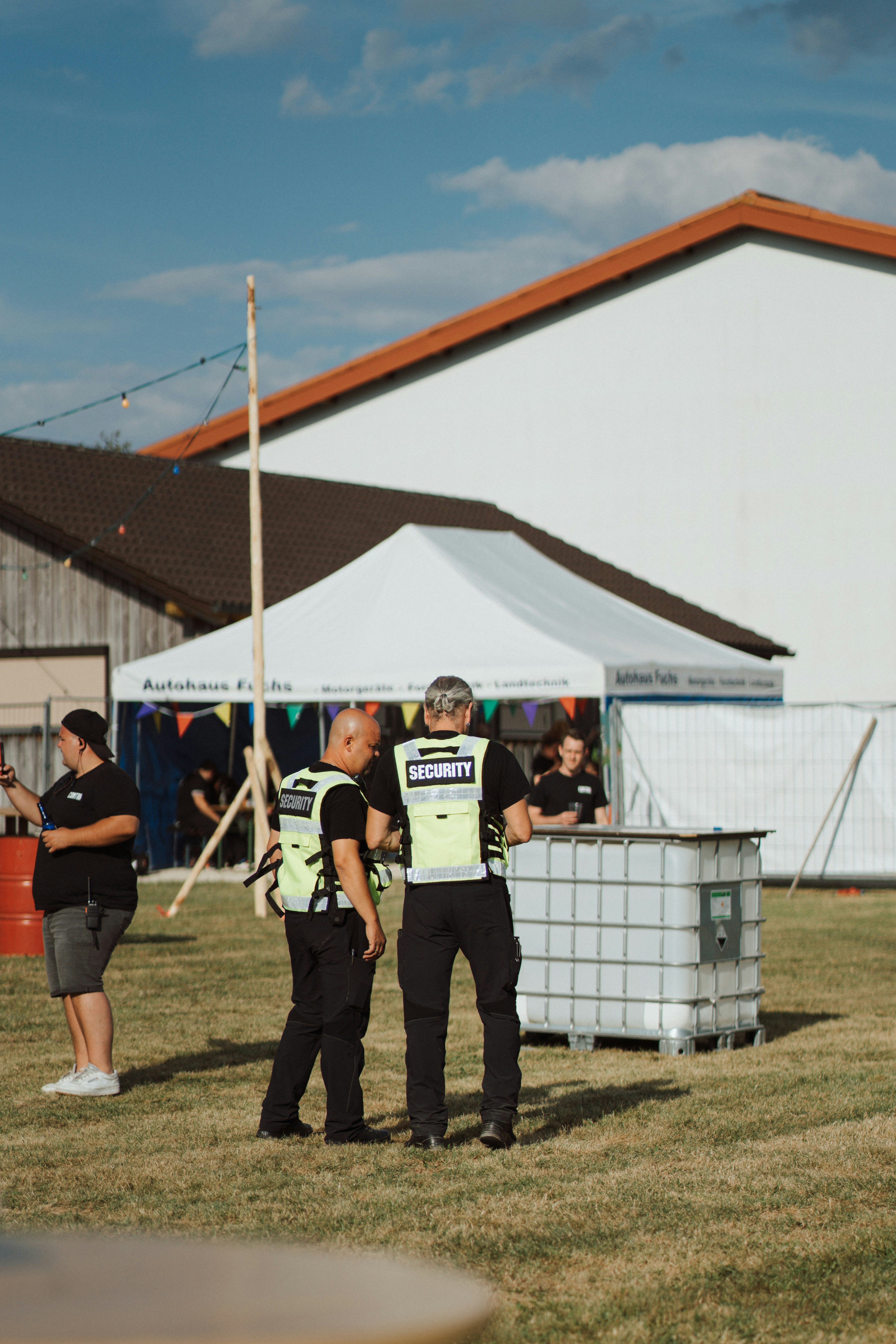 Two security guards at a festival