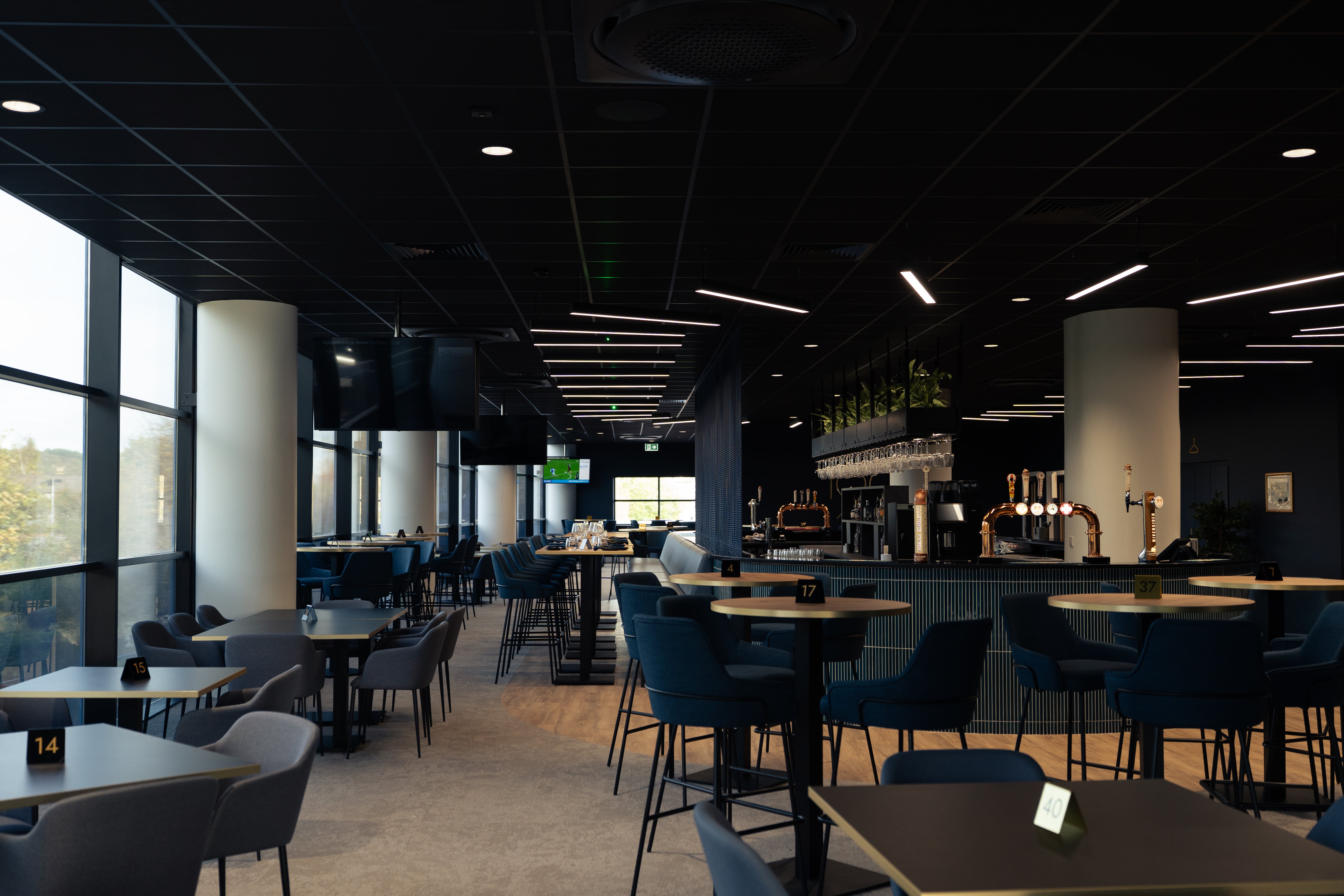 Interior design suite for the directors at Ipswich stadium Furniture and styling on the tables by Designers Touch