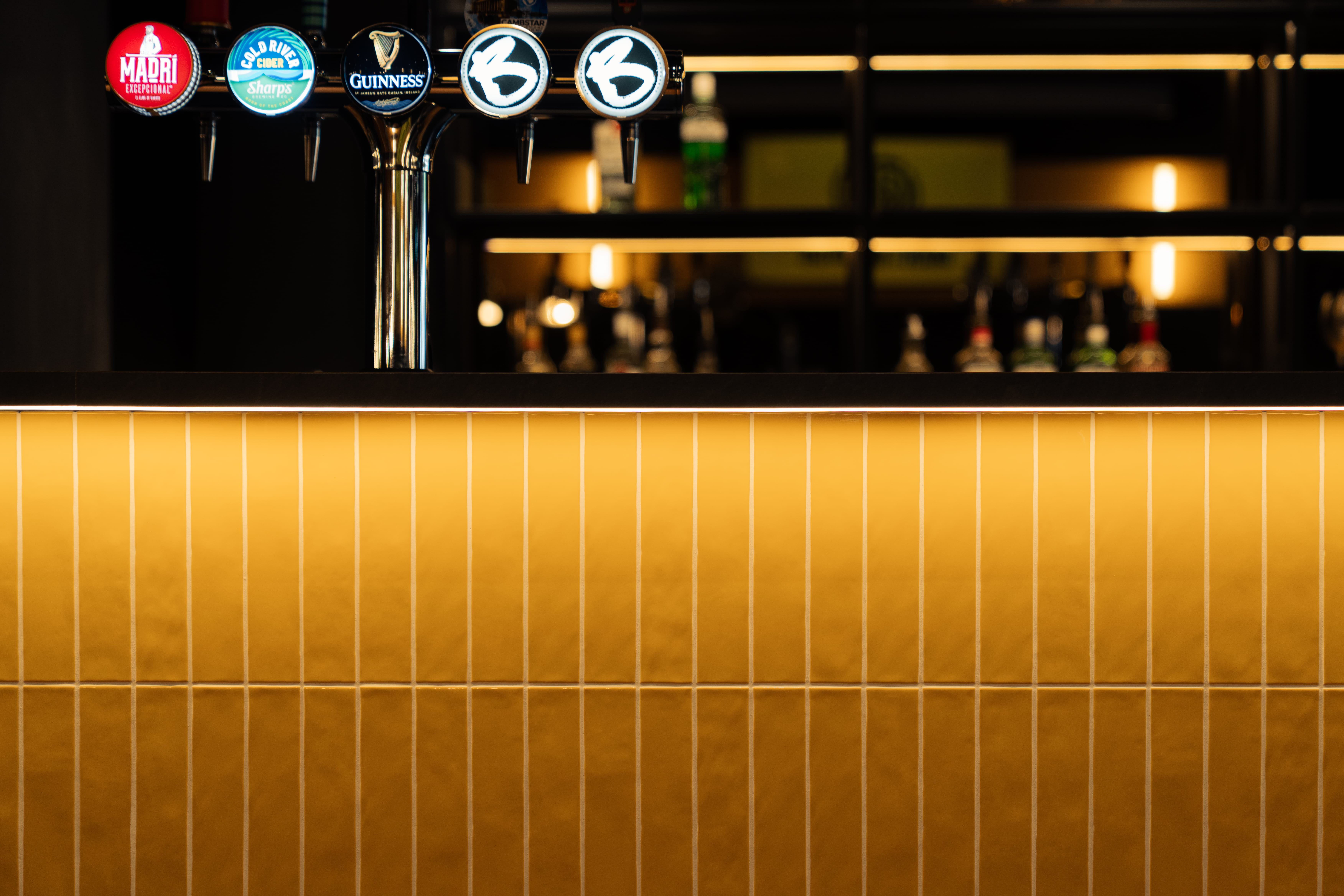 A premium bar with fine details designed by Layrd interior design firm