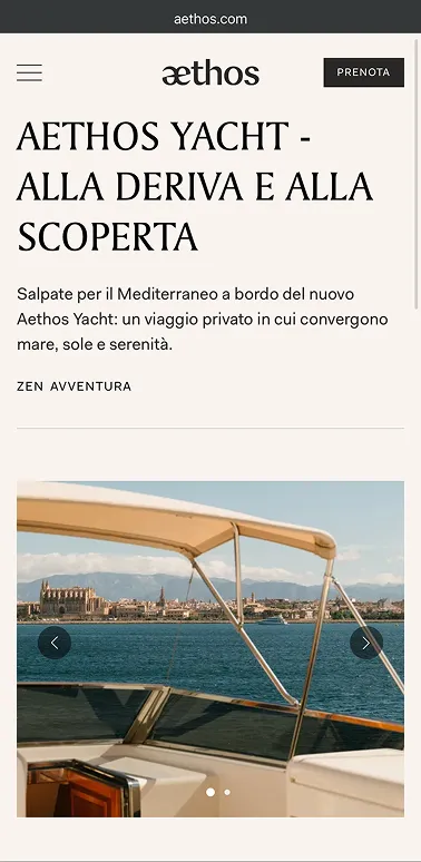 A screenshot of a webpage from WIldflower Farms, Auberge Resorts Collection featuring a bookable experience titled Hudson Valley in Bloom: Floral Design Workshop with Ariella Chezar. In includes a large beautiful photo of Ariella reaching out and touching the branch of a creeping vine abloom with flowers.