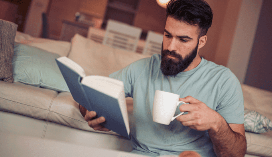 Man-Reading-Book-Relaxing