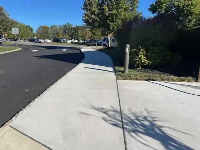 Commercial sidewalk installation as part of landscaping project