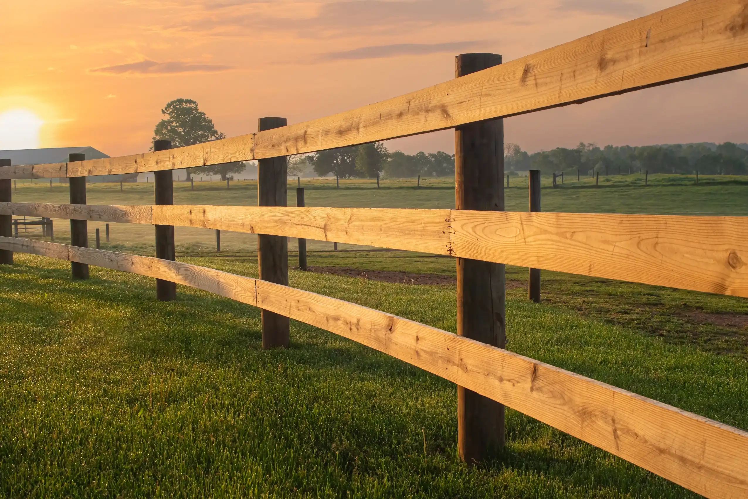 Professional split rail wood fence installation services by G. DeLuca and Sons
