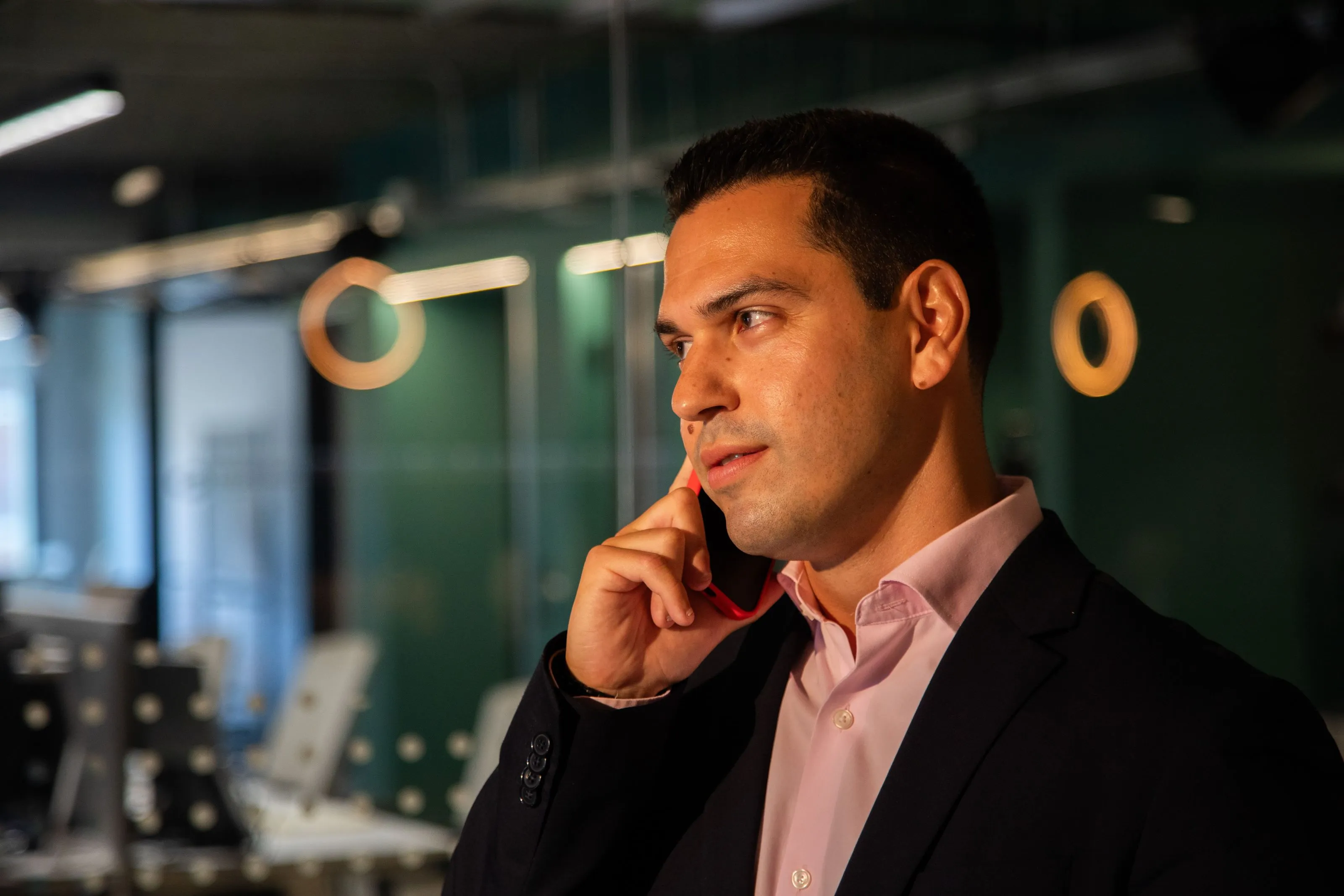 CEO Ruben talking on the phone.