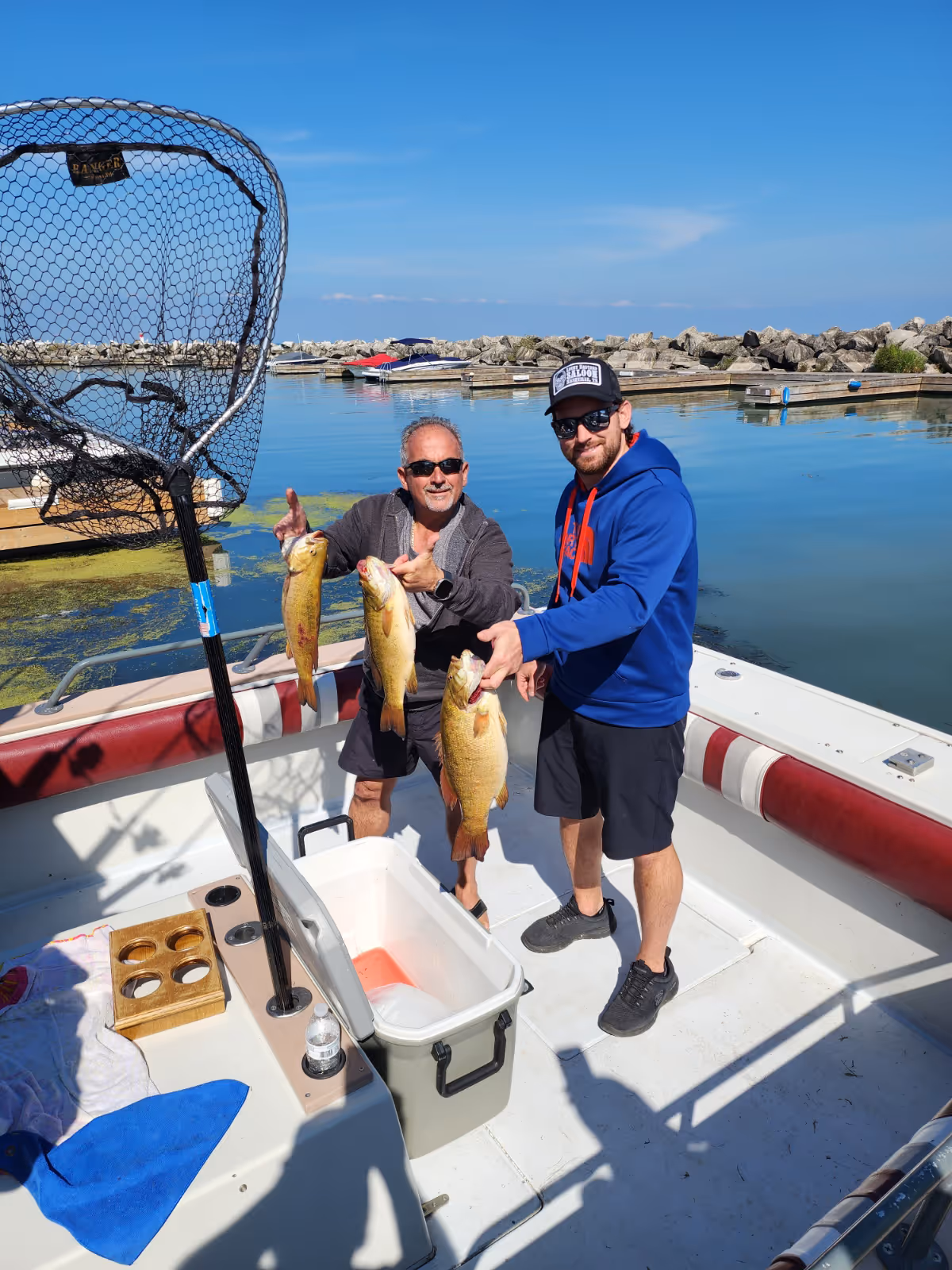 Danny and Kalan Ricci holding fish