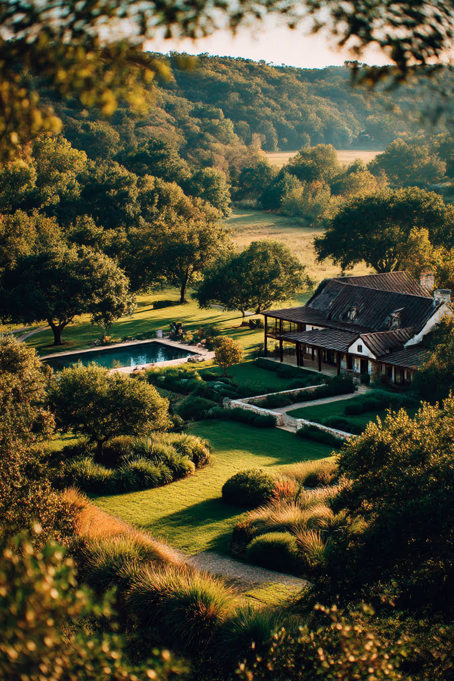 A house in the hill country surrounded by trees