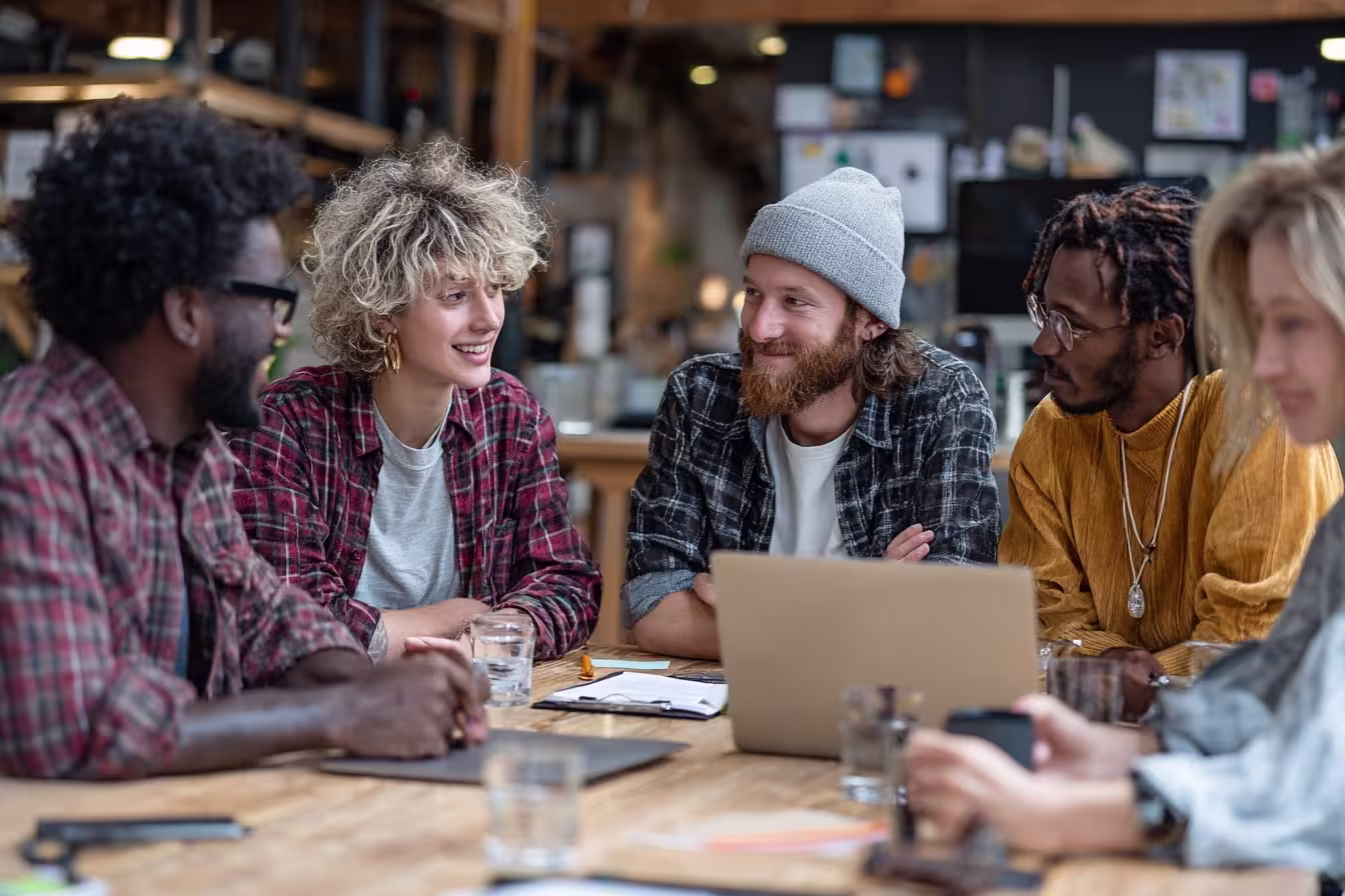 Diverse team conducting IT assessment meeting