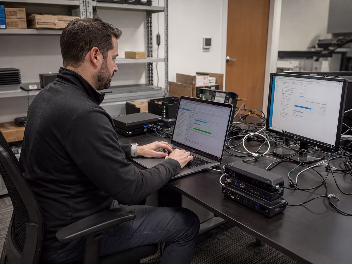 Diverse IT professionals during system testing