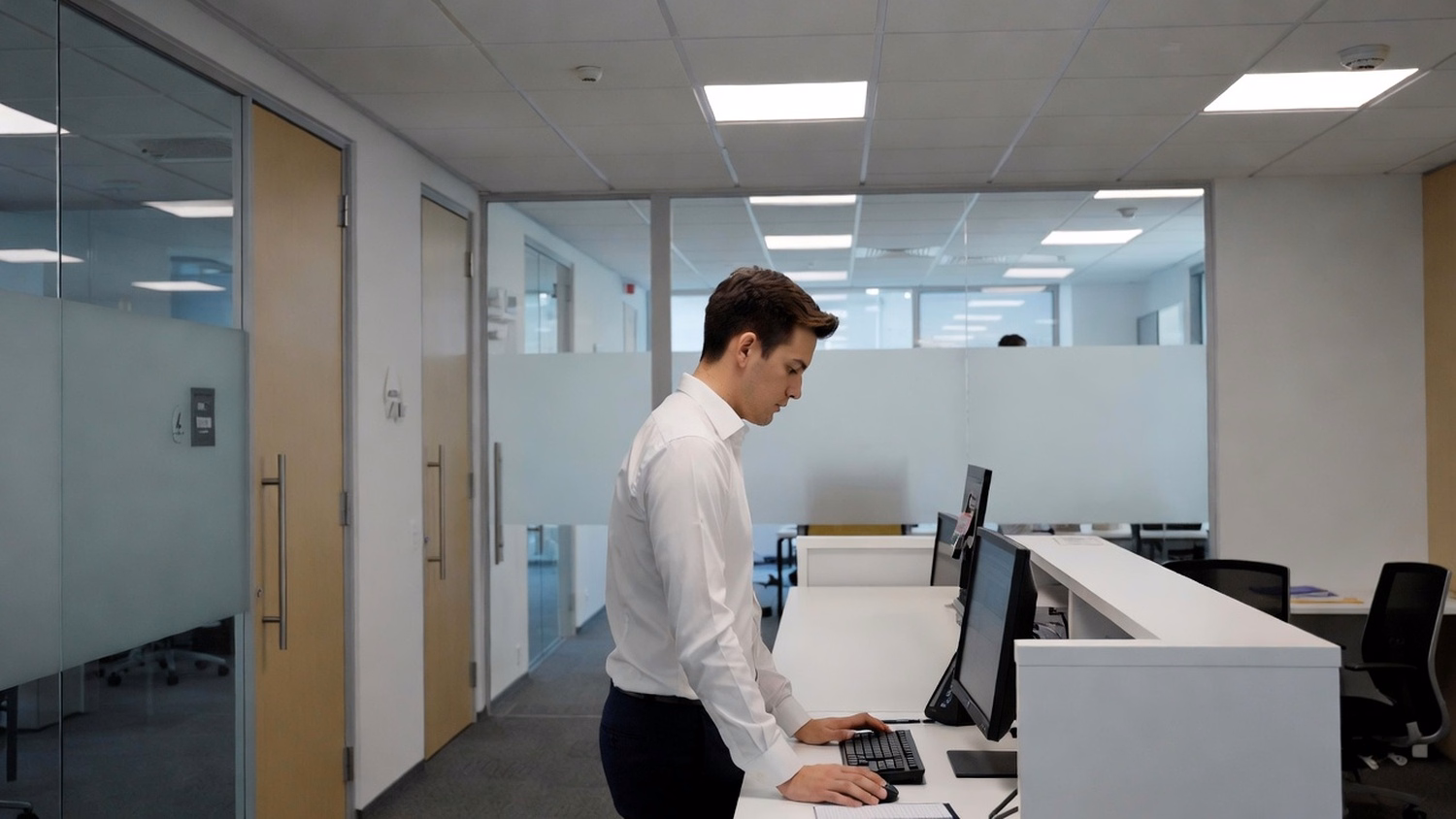 RECEPTION AREA An IT professional one person standing at a front reception d