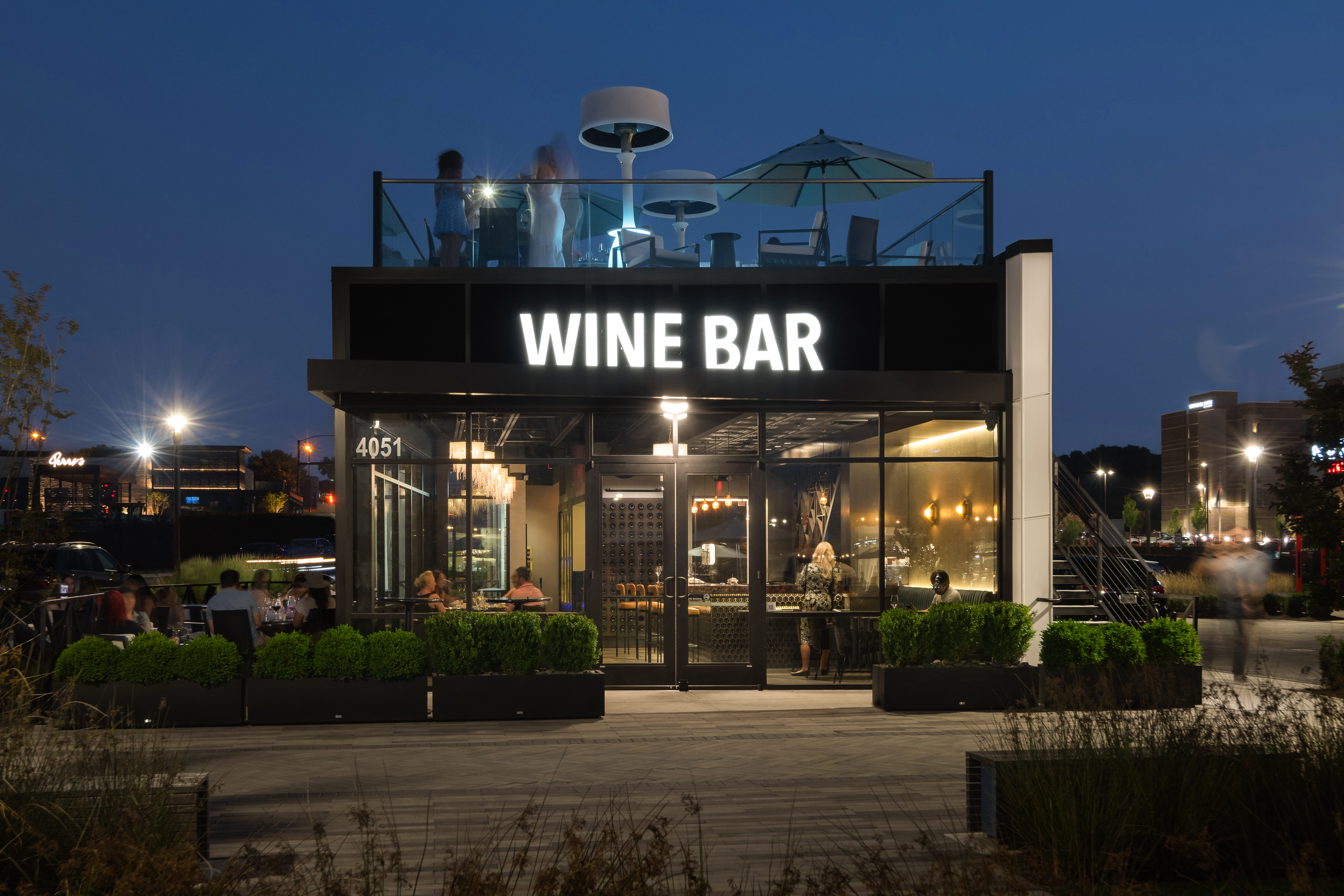 vintage vines 100 wine bar building sign