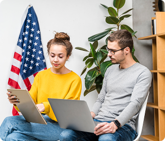 ARA 2 people looking into computers