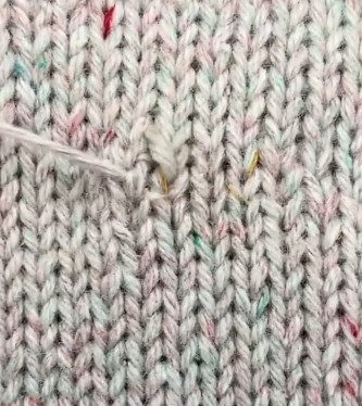[background image] image of fabric rolls on shelves (for a tailors & alteration shop)