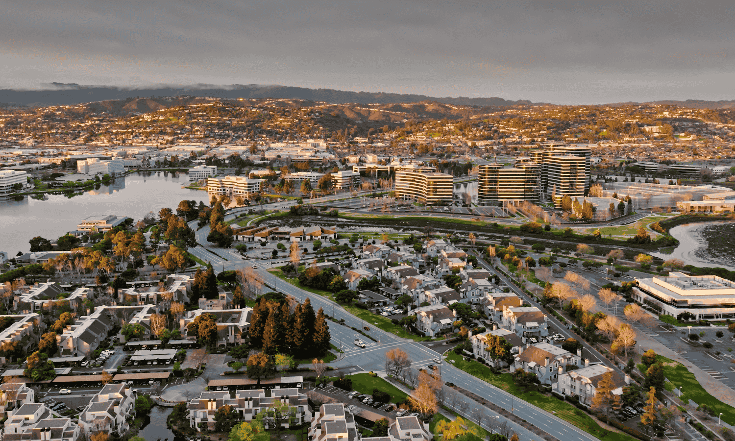 Map highlighting Southern NH & Merrimack Valley neighborhoods, transit routes, parks, and schools.
