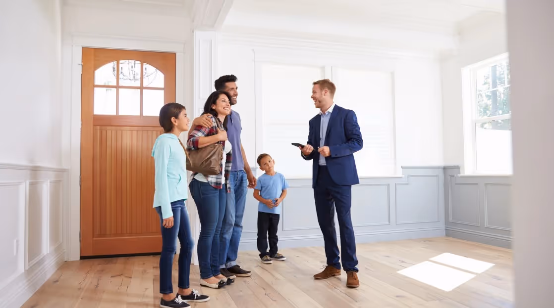 Homebuyers inspecting a house interior in Southern New Hampshire during spring