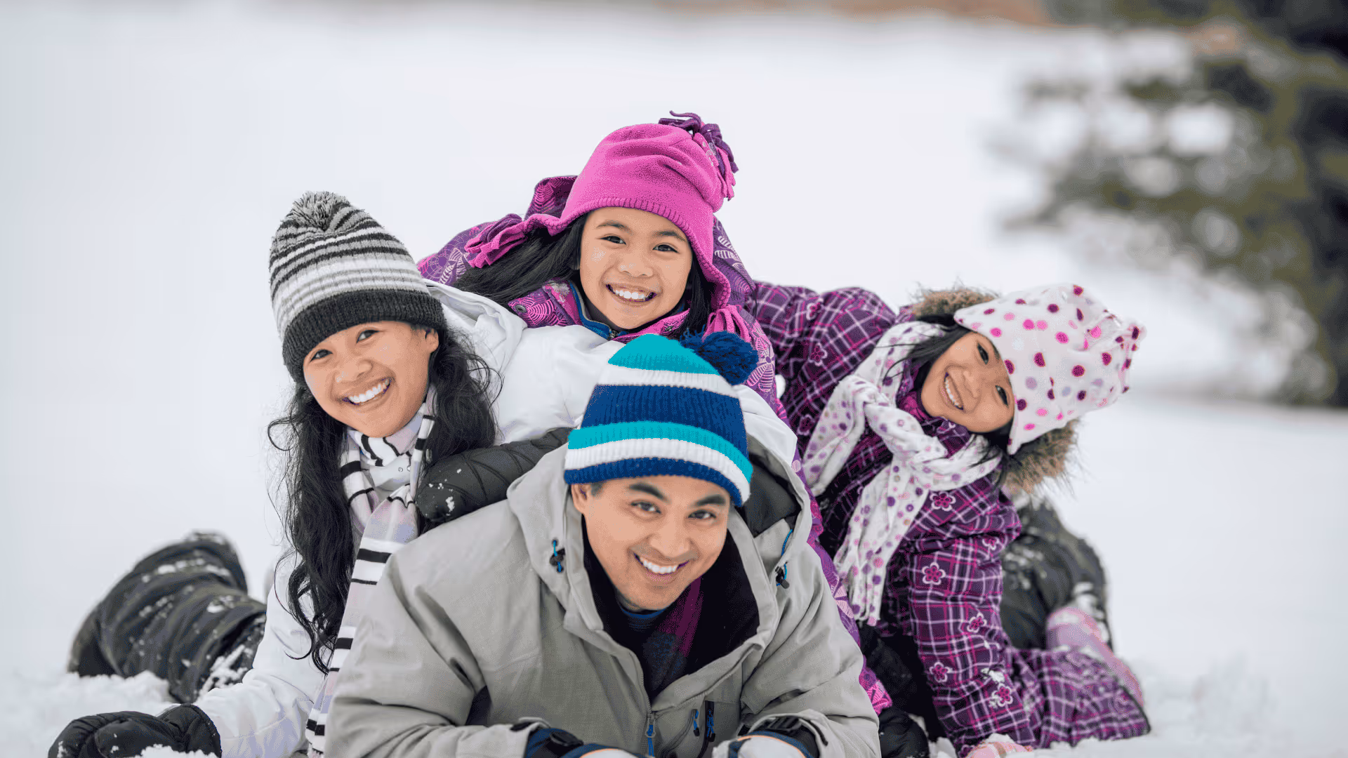 Families attending an outdoor festival in Merrimack Valley during late winter